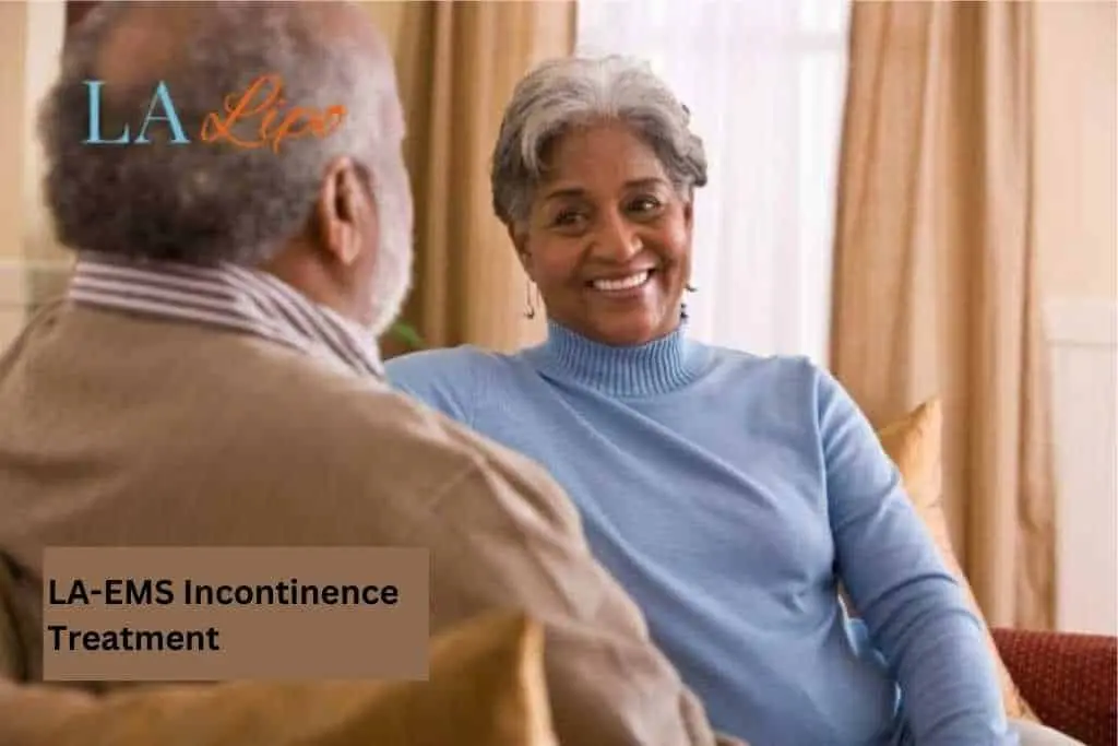 Couple sat smiling at each other - LA-EMS treatment Edgware