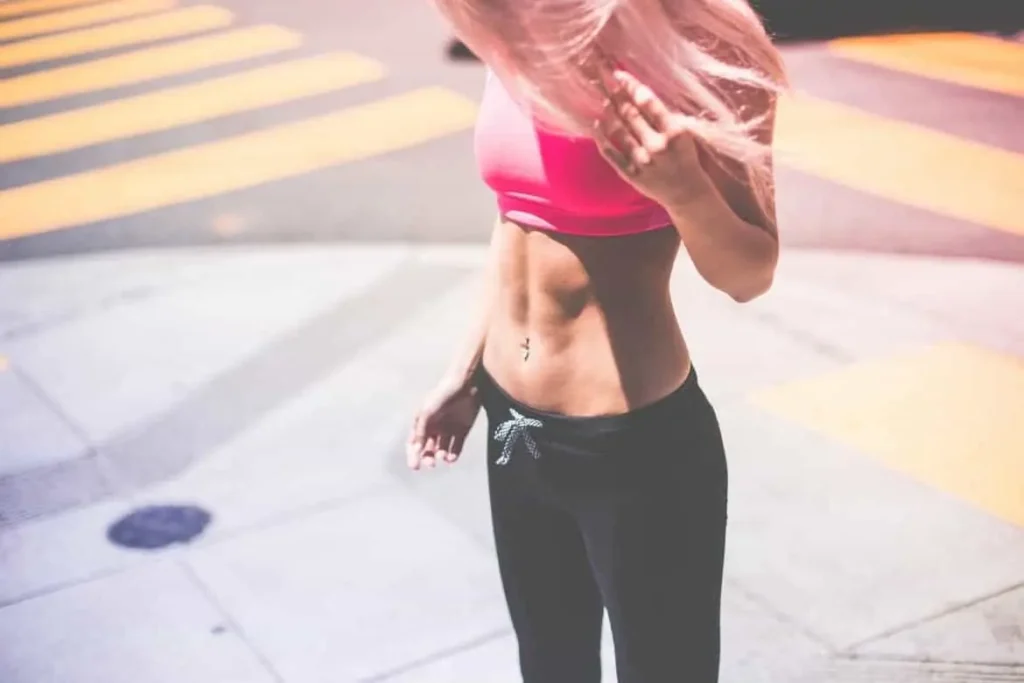 Woman with toned stomach after LA-EMS Body Sculpting Treatment Edgware